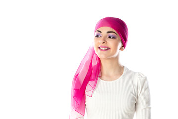 Young brunette woman wearing pink head scarf