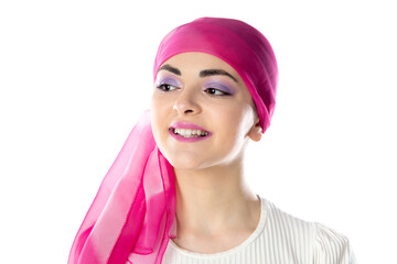 Young brunette woman wearing pink head scarf