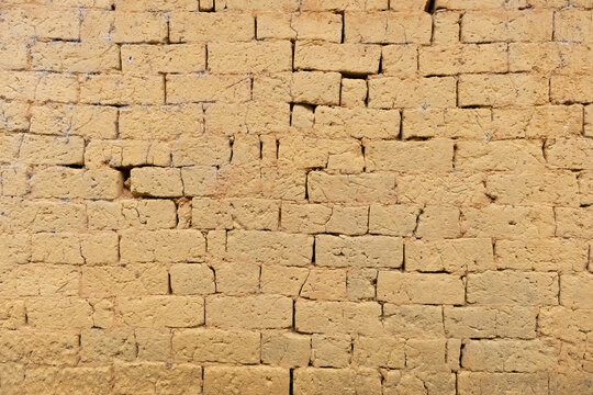wall made of mud as background and texture