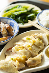 angle view fast food of steamed chicken with eggplant and vegetable and bowl of rice vertical composition