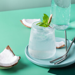 Tropical hard seltzer cocktail with coconut water and ice