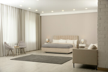 Beautiful hotel room interior with double bed