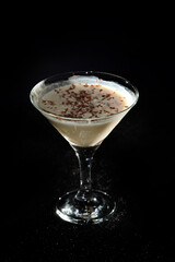 Alexander Cocktail on black background