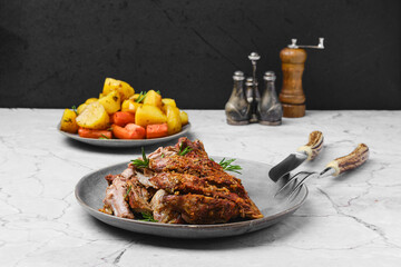 Pulled lamb meat baked in oven with potato and carrot