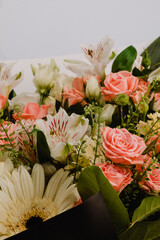 Bouquet of flowers with eustoma, alstroemeria, mini rosa, gerbera and carnations diantus.