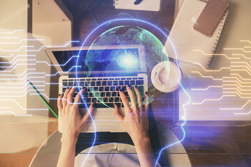 Double exposure of woman working on computer andhuman brain hologram drawing. Top View. Ai concept.