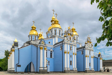 Fototapeta na wymiar Kyiv, Ukraine - May 14 2021: majestic St. Michael's Golden-Domed Cathedral in Kyiv and the evening sky. Famous historical monument in Kievan Rus. Ancient Christian Orthodox churches with golden domes