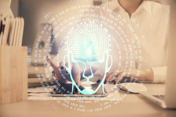 Double exposure of brain sketch hologram and woman holding and using a mobile device.