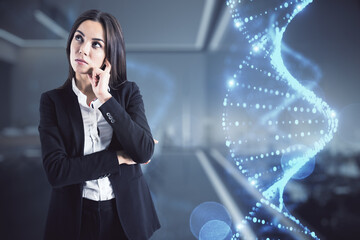 Bio engineering and nanotechnology concept with pensive businesswoman and dna strand hologram on...