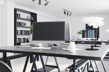 Black computer monitor with copyspace on dark wooden table in stylish office. 3D rendering, mockup