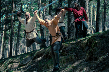 Vikings running and jumping into battle to go to balhalla.