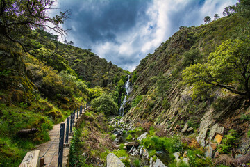 Fototapeta na wymiar Landscape Of A Spectacular Waterfall In The Middle Of Nature Called: El Chorrituelo De Ovejuela. Located In Las Hurdes, North Of Cáceres-Spain. Nature