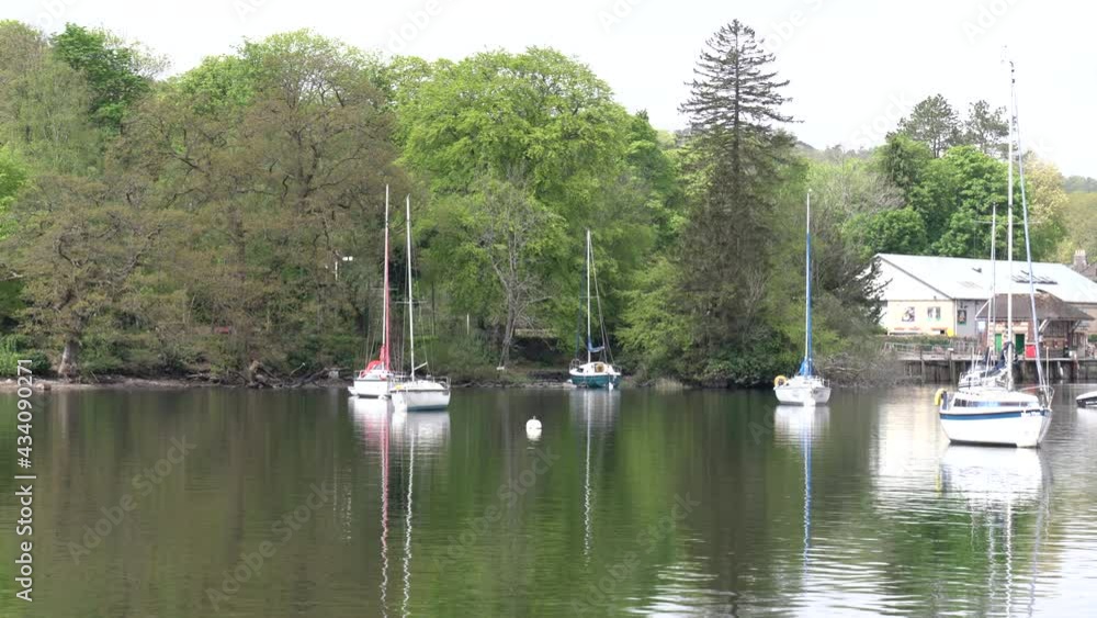 Poster windermere the lake district england uk with sailing boats in good spring weather pan