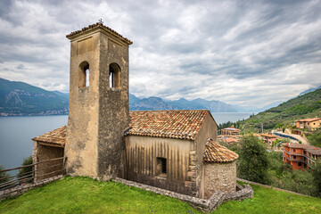 Fototapeta premium Small Church of San Antonio Abate (Saint Anthony Abbot) in Romanesque style, XIII-XIV century, Blaza district, Brenzone sul Garda, Lake Garda, Verona province, Veneto, Italy, Europe.