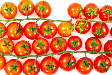Top view of strings of bulk cherry tomatoes