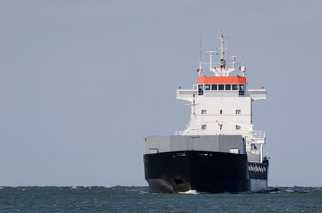MERCHANT VESSEL - Freighter sails on the sea
