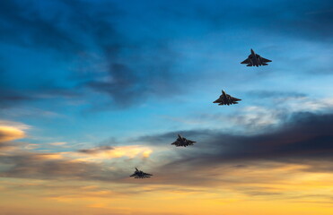 Fighter planes on the background of the sky.