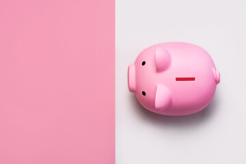 top view of pink piggy money bank  with copy space
