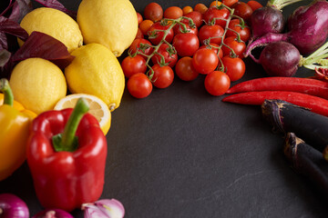 Fresh fruits and vegetables for background, Different fruits and vegetables for eating healthy, Colorful fruits and vegetables isolated on dark background. clean vegan eating concept.