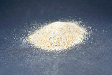 Indian flea seeds photographed in the studio against a black background