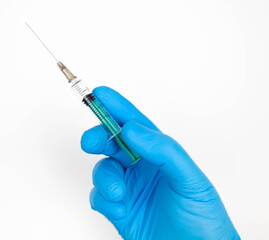 hand holding syringe, ready for vaccination