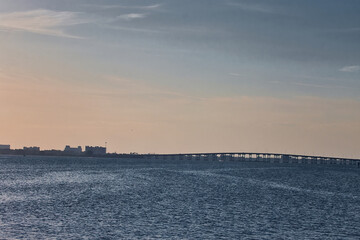 Bird watching in at the Melbourne beach pier in Florida at sunset on the Indian river