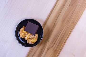 Cookies and chcolate on wooden table