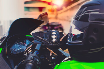 Biker motorcycle accessories placed on rustic bucket