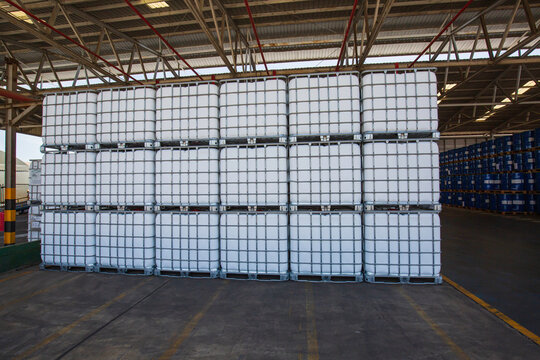 Chemistry white tank on pallets are storage in the warehouse factory