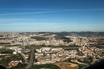 Aerial view of Lisbon landscape from a plane in a clear day