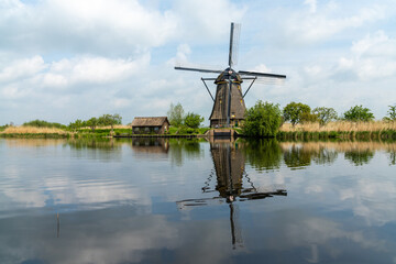 view of a historic 18-century windmill at Kinderdijk in South Holland