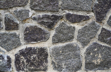 Texture of a stone wall. Part of a Stone wall as a background or texture. Texture Of Medieval Wall...