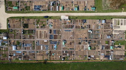 An aerial view of some allotments surrounded by fields