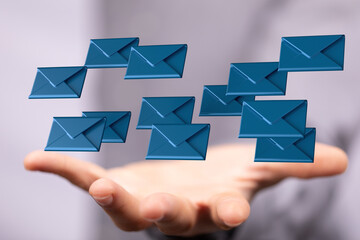  email icon concept in hand background