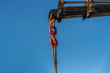 Fototapeta premium close-up of crane hook lifting load