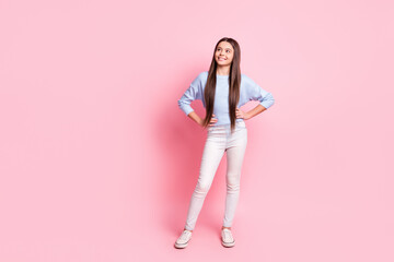 Full length body size view of attractive cheerful girl creating idea solution isolated over pink pastel color background