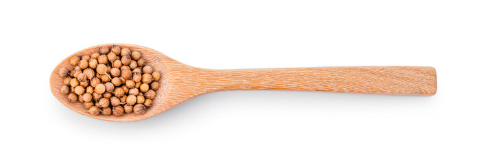 Coriander seeds in wood spoon on white background