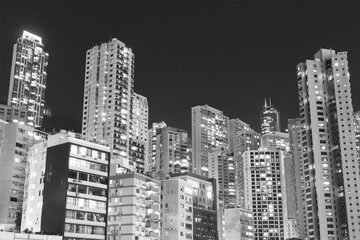 Fototapeta na wymiar high rise residential building in Hong Kong city at night