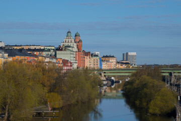 The canal Karlbergs kanalen in Stockholm with residential and office buildings a sunny spring morning
