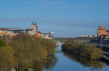 The canal Karlbergs kanalen in Stockholm with residential and office buildings a sunny spring morning