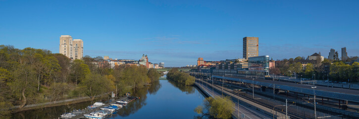 The canal Karlbergs kanalen in Stockholm with residential and office buildings a sunny spring morning