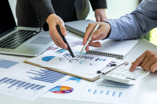 Team of business people working together in the meeting room office,Business and Statistics Marketing Finance and graphs banner, double exposure successful teamwork,business planning concept.