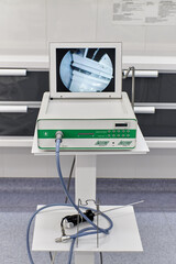 equipment with a monitor for dental treatment in a dental office