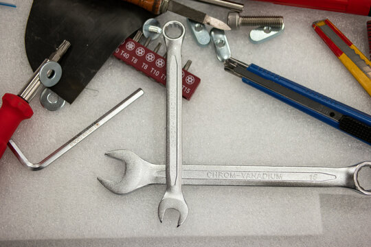 Messy Tool Desk Top View Scattered And Unorganized Work Tools No People