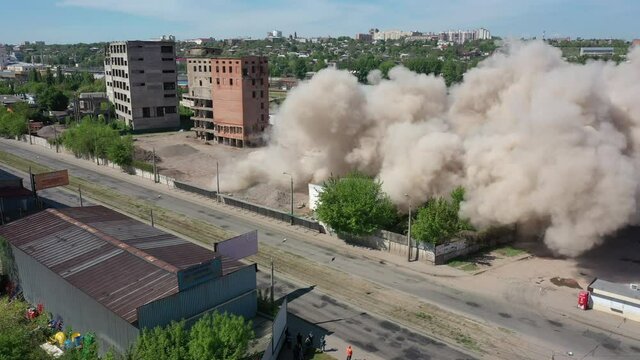 Kharkiv, Ukraine: falling tower of old grain elevator building after undermining
