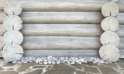 white log wall on a stone foundation