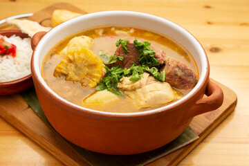 Sancocho is a traditional Venezuelan and Latin American soup or stew made with many types of beef, chicken with Yuca Plantain Potato Cassava and vegetables from the region