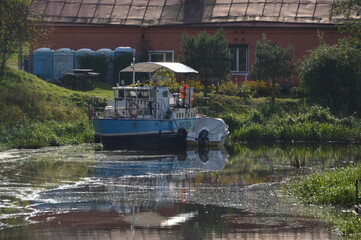 Fototapeta na wymiar Russia, Leningrad region, Staraya Ladoga, boat on the Ladozhka River, boat on the river