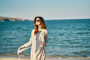 Fototapeta na wymiar woman tourism travel sea sand beach mountains fresh air relax