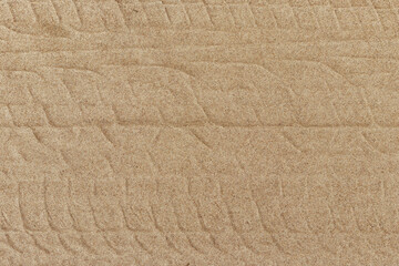 Sand with tire tracks